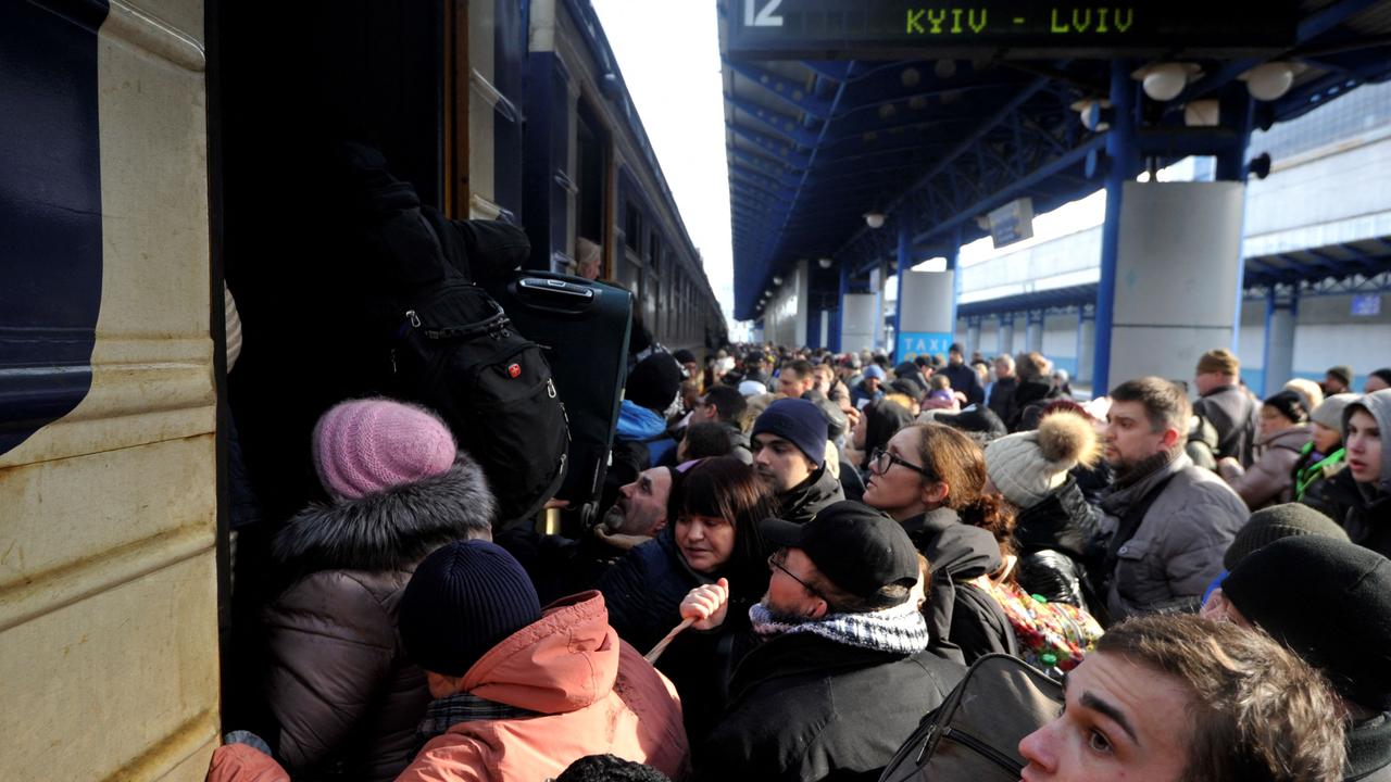 People try to get an evacuation train at Kyiv central train station. Picture: AFP