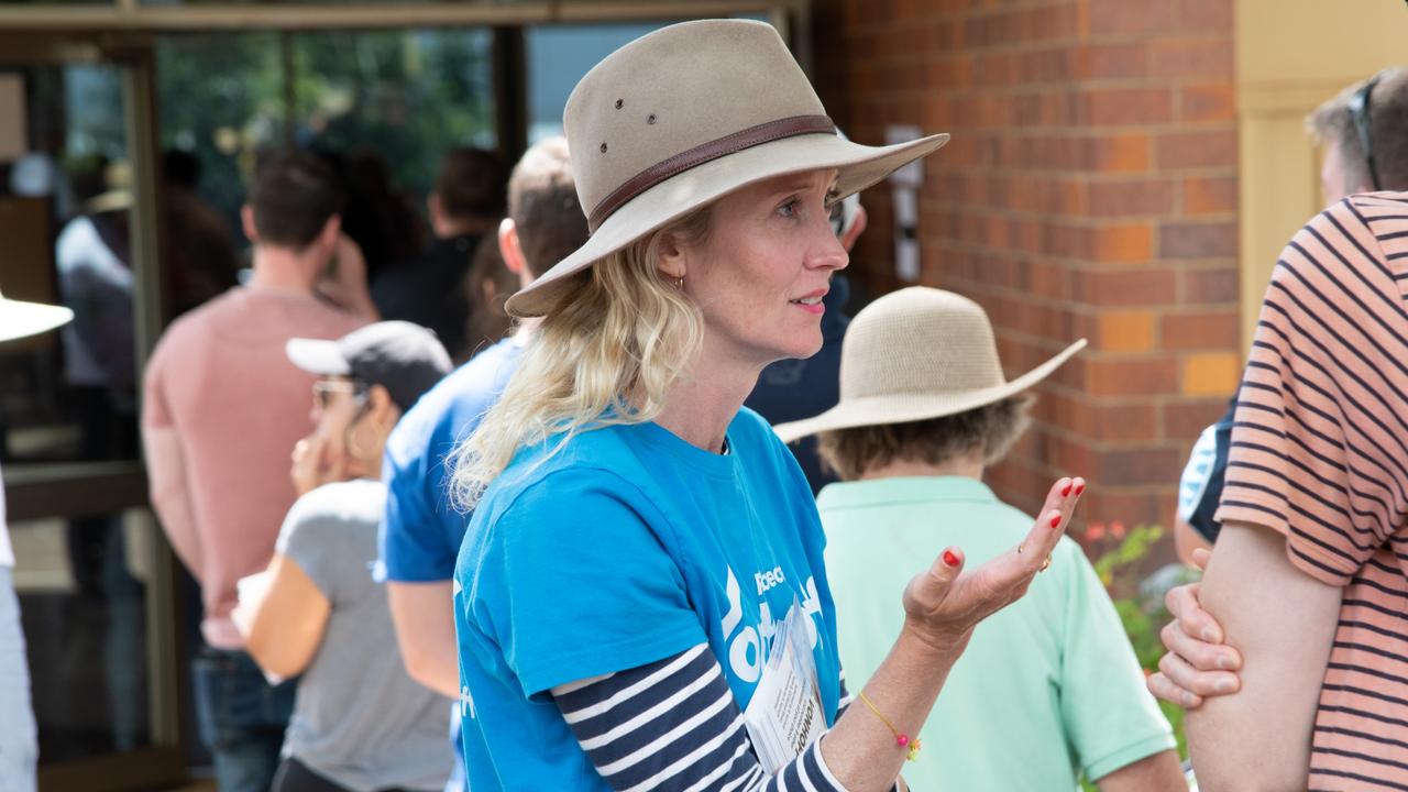 Rebecca Vonhoff chats to voters at the polling booth at Centenary Heights High School. TRC election Saturday March 16, 2024. Picture: Bev Lacey