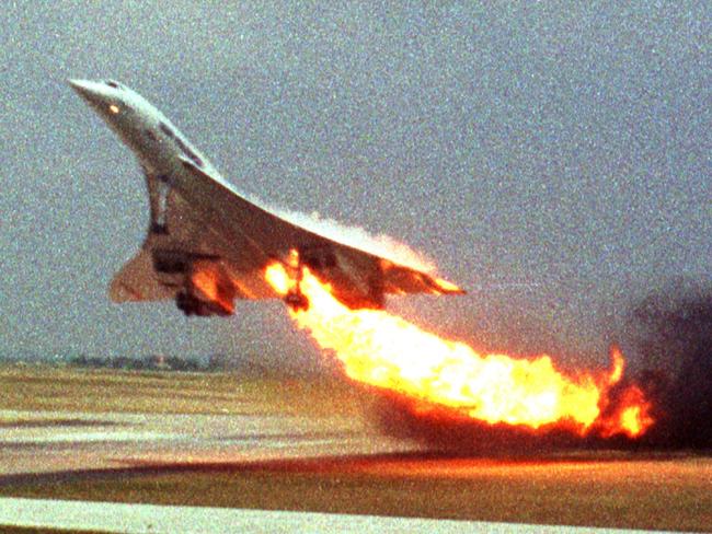 Air France Concorde flight 4590, with fire trailing from the engine on the left wing, takes off from Charles de Gaulle Airport, Paris, on July 25, 2000. The plane crashed shortly after take-off, killing all the 109 on board and four others on the ground. Japanese businessman, Toshihiko Sato, took this picture from inside another aircraft. Picture: AP