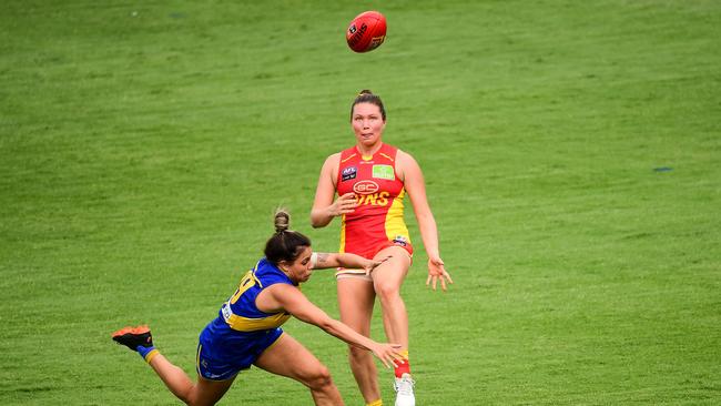 Jade Pregelj of the Suns kicks the ball during the 2020 AFLW Round 06 match between the West Coast Eagles and the Gold Coast Suns at Mineral Resources Park on March 15, 2020 in Perth, Australia. (Photo by Daniel Carson/AFL Photos via Getty Images)