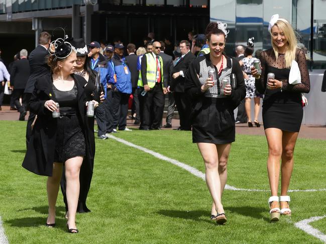 Crowds arriving on Victoria Derby Day at Flemington Racecourse on Saturday, November 1, 2014, in Flemington, Australia. Picture: Hamish Blair