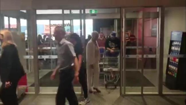 Customers walk through the doors of Rockhampton's first Aldi