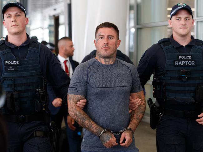 SYDNEY, AUSTRALIA - NewsWire Photos FEBRUARY 10, 2023: Comanchero boss Allan Meehan has been extradited from Queensland and arrived at Sydney Airport under a heavy police presence. Picture: NCA NewsWire / David Swift