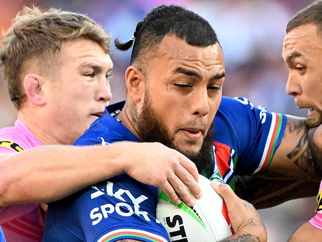 BRISBANE, AUSTRALIA - MAY 06: Addin Fonua-Blake of the Warriors is tackled during the round 10 NRL match between the New Zealand Warriors and Penrith Panthers at Suncorp Stadium on May 06, 2023 in Brisbane, Australia. (Photo by Bradley Kanaris/Getty Images)