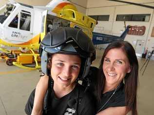 RACQ Lifeflight recipient Connor Creagh, 12, and his mother Danielle Miles met the team that rescued Connor. Picture: Liam Kidston