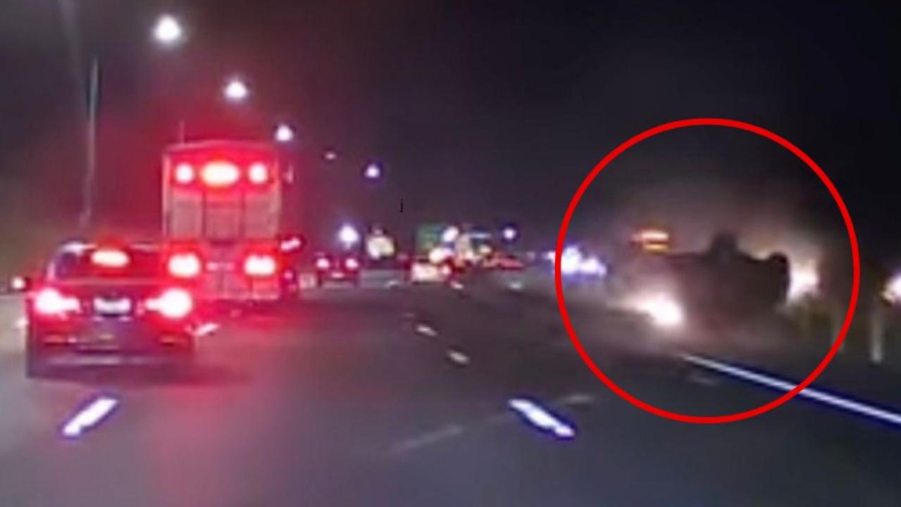 Wild moment car flips on major highway