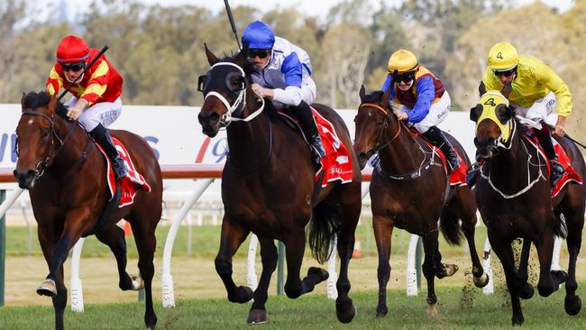 Coastwatch (blue cap) will tackle the Group 2 Stan Fox Stakes at Randwick. Picture: Getty Images
