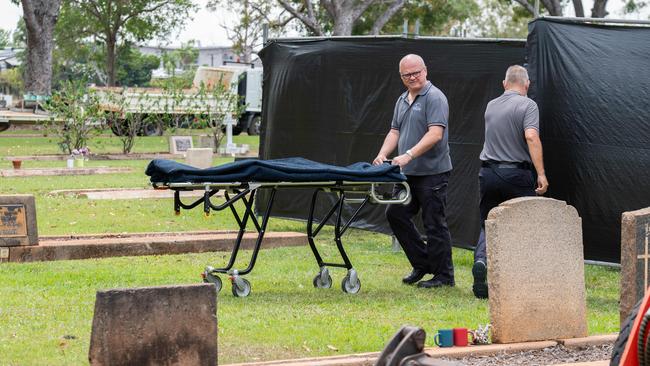 The body of the baby sent in the mail was exhumed from Darwin General Cemetery on Wednesday, with hopes a DNA match could solve a decades old cold case. Picture: Pema Tamang Pakhrin