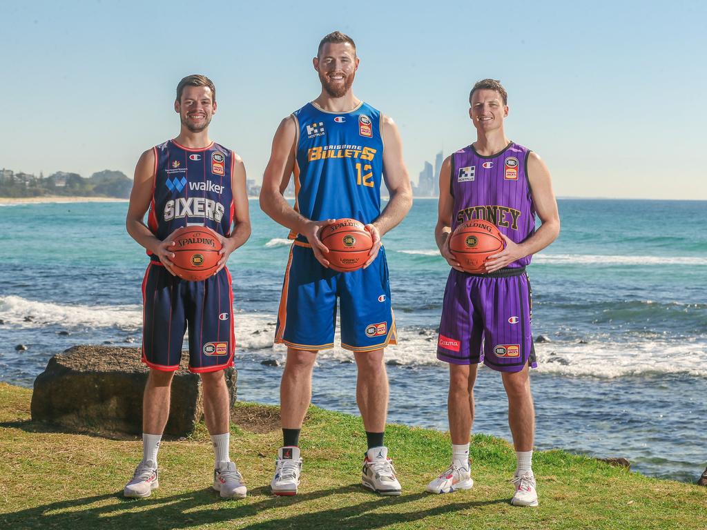 Adelaide 36ers player Jason Cadee, Brisbane Bullets player Aron Baynes and Sydney Kings’ Shaun Bruce at Burleigh Heads. Picture:Glenn Campbell