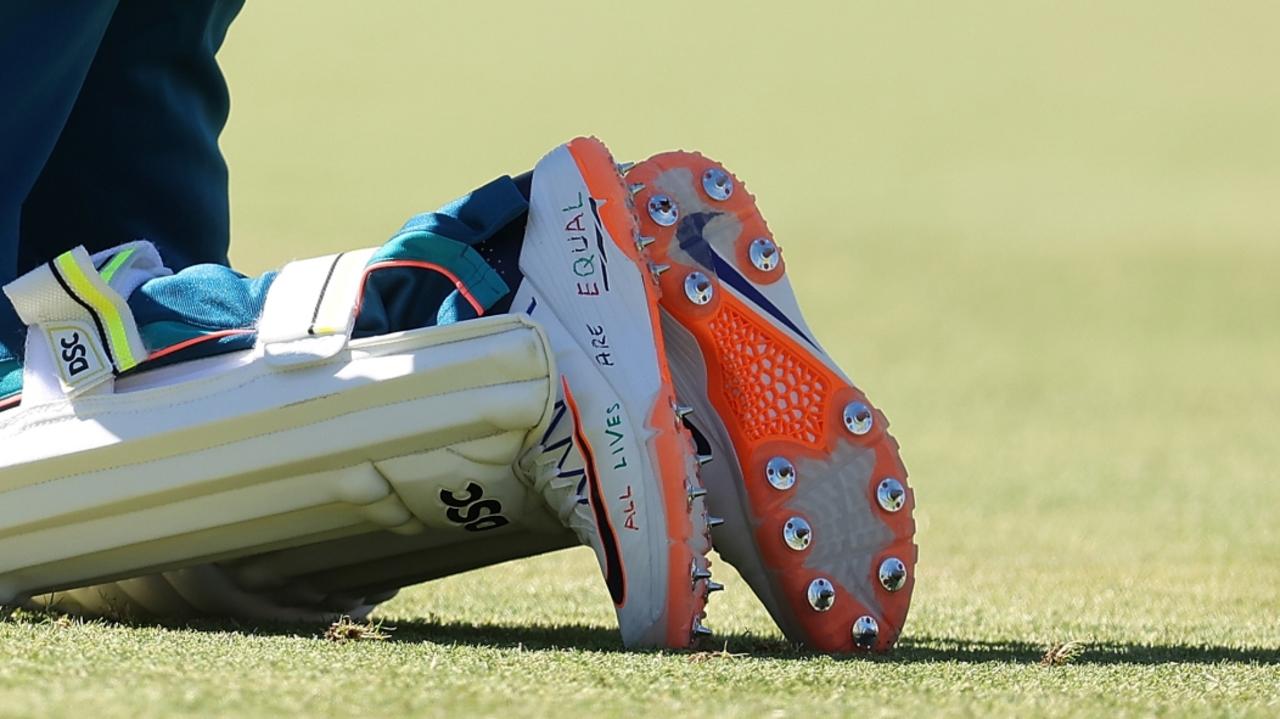 Khawaja’s boots read “Freedom is a human right” and “All lives are equal”. (Photo by Paul Kane/Getty Images)