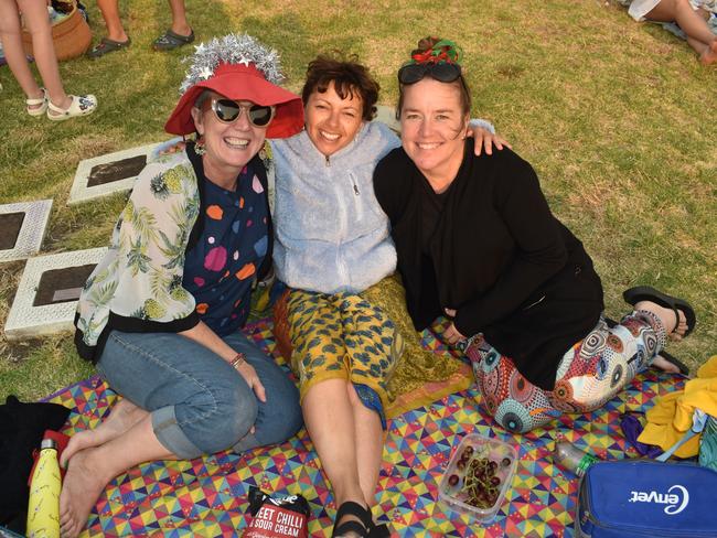 Kerry McGennisken, Helen Tavakkoli and Annette Watson at the San Remo Christmas Carols at the foreshore on Friday, December 20, 2024. Picture: Jack Colantuono