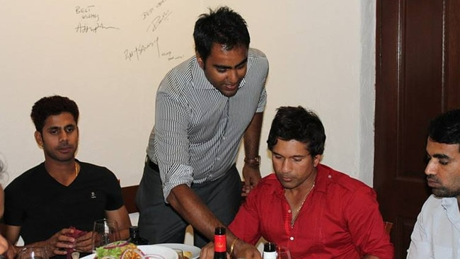 Sachin Tendulkar (red shirt) at the British Raj restaurant on Henley Beach Road. Picture: Facebook.