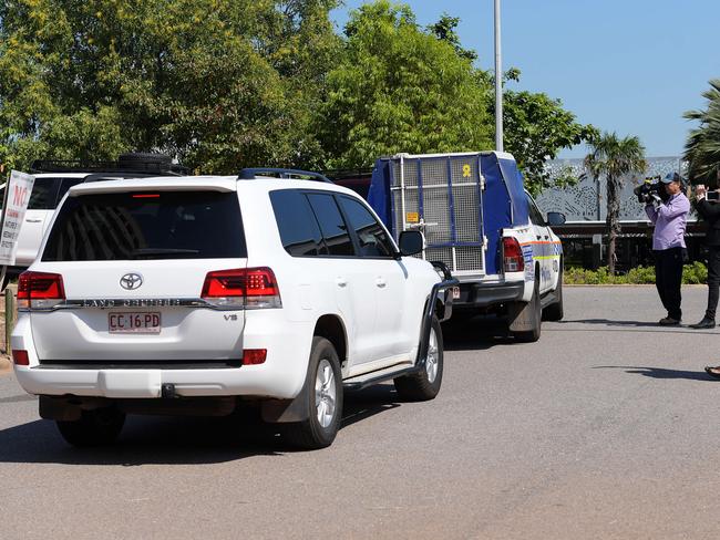 A police car carrying Ben Hoffmann leaves the Royal Darwin Hospital. Picture: Keri Megelus