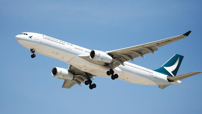 A Cathay Pacific jet plane from Hong Kong comes in to land at the Cairns International Airport before the carrier’s exit in 2019. PICTURE: BRENDAN RADKE