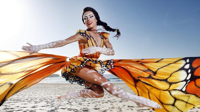 Cirque du Soleil star Helena Merten performs as the ‘running woman’ who spreads her giant wings in a tribute to the monarch butterfly. Picture: Richard Dobson