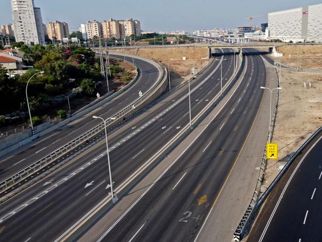 An aerial view taken in the Israeli Mediterranean city of Netanya, shows an empty road after the authorities imposed a series of new measures meant to curb the spread of the novel coronavirus, on September 18. Picture: AFP