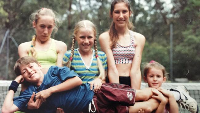 John Millman aged nine with his four sisters.