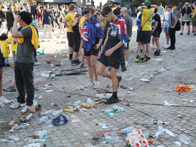 Fans left Federation Square piled with rubbish. Picture: NCA NewsWire / David Crosling