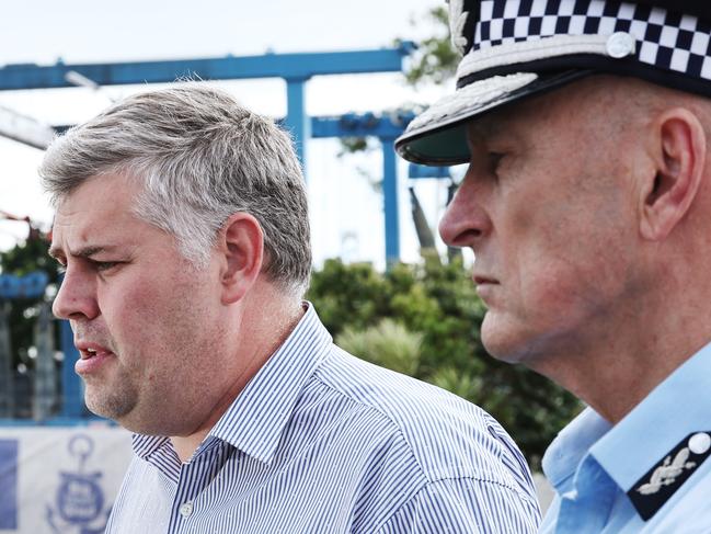 Former police minister Mark Ryan with Commissioner Steve Gollschewski