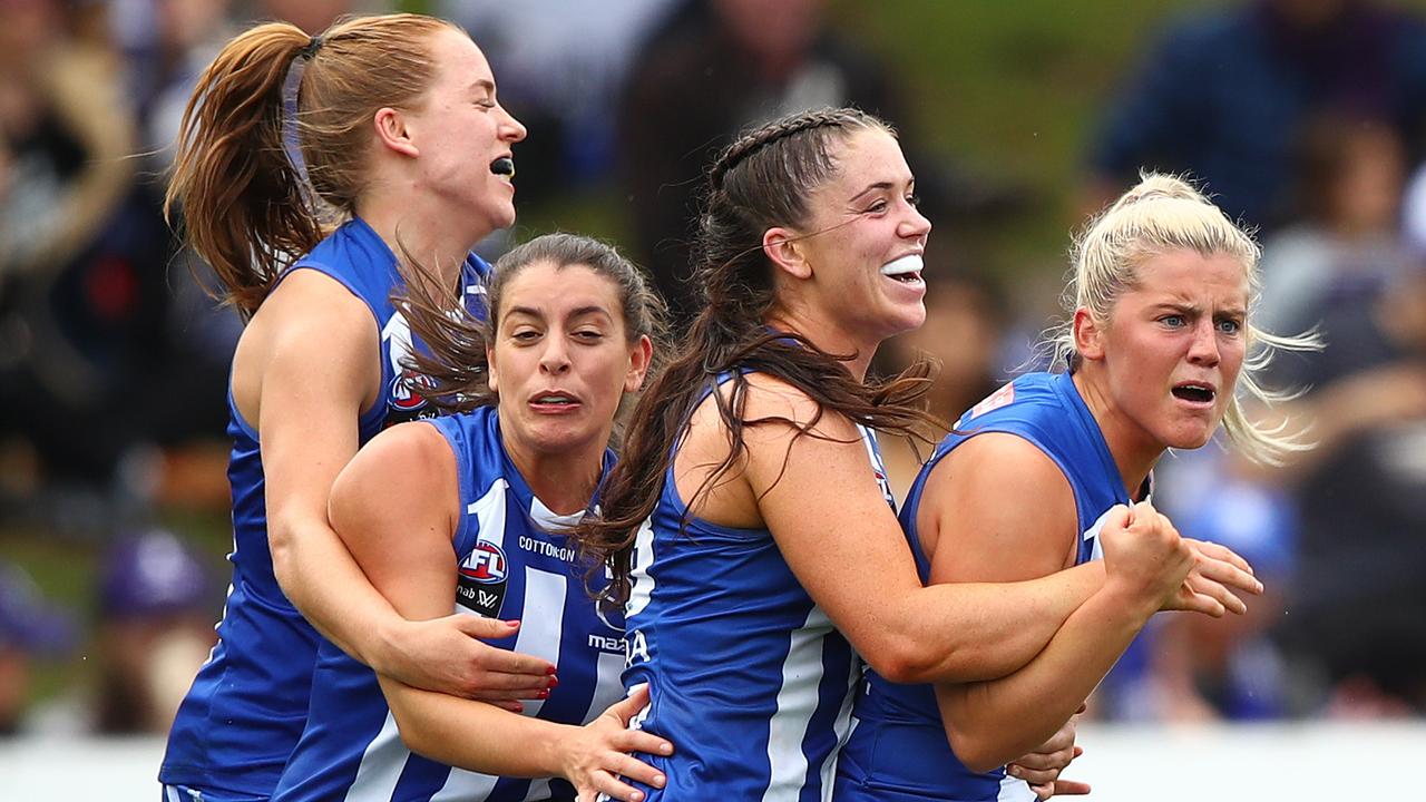 Daisy Bateman of the Kangaroos celebrates after scoring a goal.