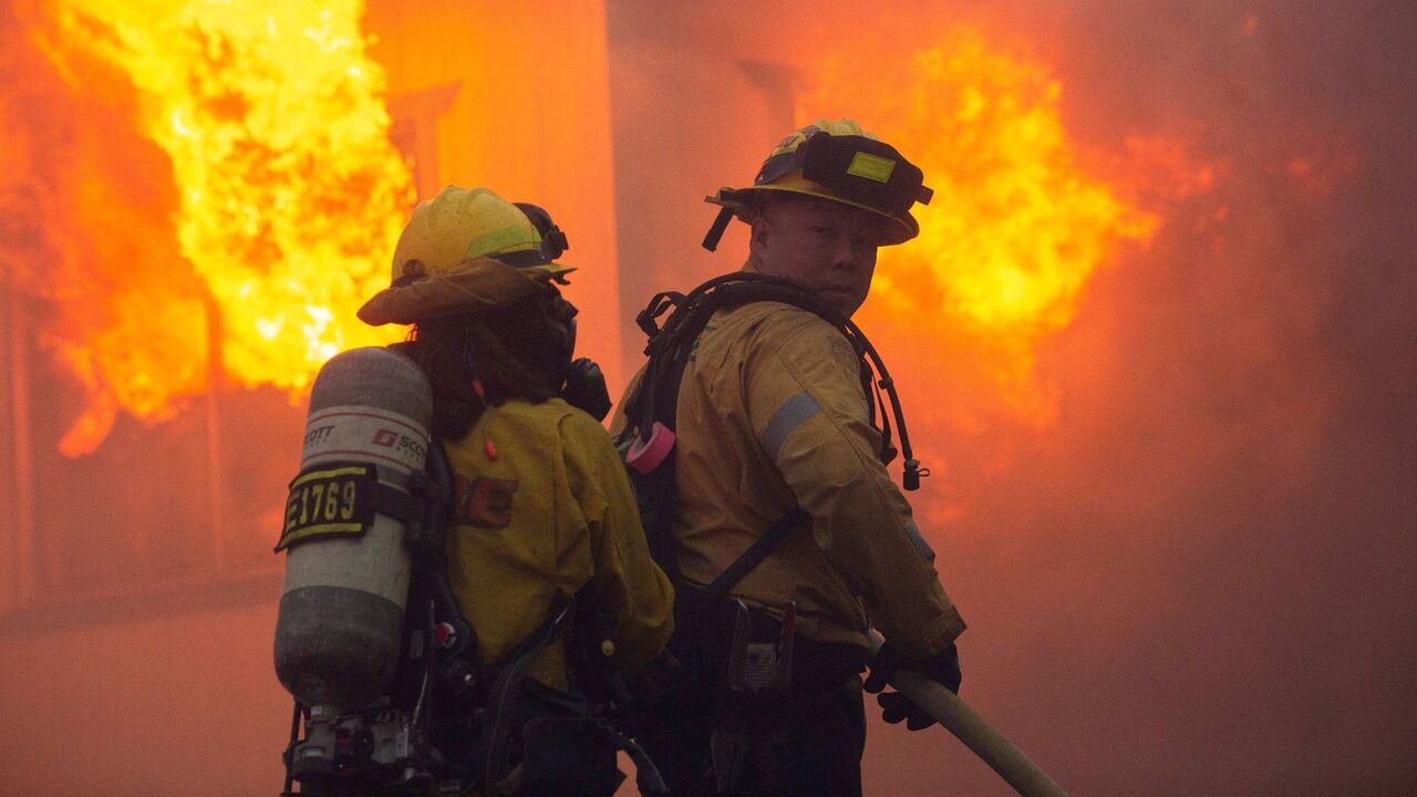 Thousands evacuated as Palisades fire razes homes in Los Angeles