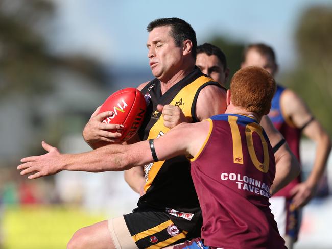 Brownlow medallist Shane Crawford playing for Aldinga against O'Sullivans Beach/Lonsdale at Aldinga Oval. Picture: Tait Schmaal