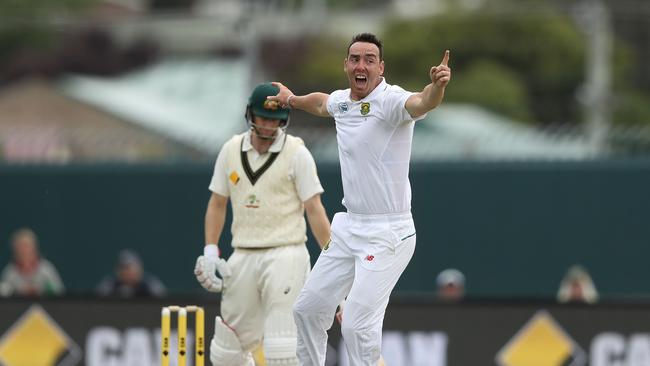 Kyle Abbott of South Africa takes the wicket of Adam Voges during day four of the Second Test match.