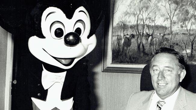 GCCC Mayor Denis O'Connell in his office with Mickey Mouse.