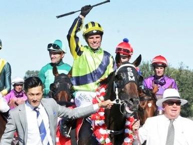 Craig Grylls celebrates Crown Prosectutor's win at the New Zealand Derby, 02 March 2019. (Image: Trish Dunell (NZ Thoroughbred Marketing)