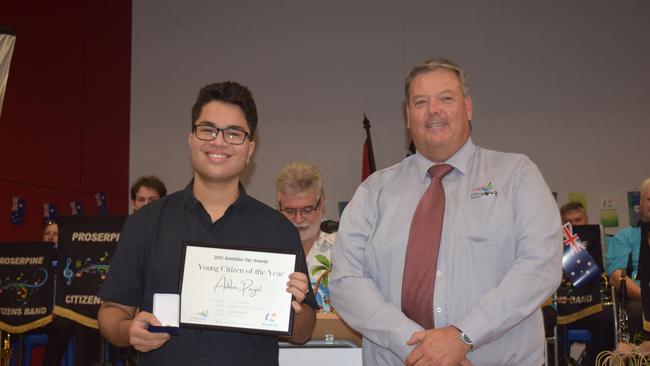 Airlie Beach/Proserpine Young Citizen of the Year Aiden Payet accepts his award from Mayor Andrew Willcox at the Australia Day Awards Ceremony. Photo: Elyse Wurm