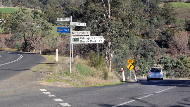 A confusion of signs on the Huon Link Road which received funding for an upgraded in the budget