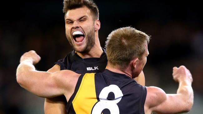 Ben Lennon celebrates a goal with Jack Riewoldt. Picture: Getty Images