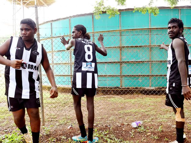 Marrawurri Magpies warm up for the grand final. PICTURE: Elise Derwin