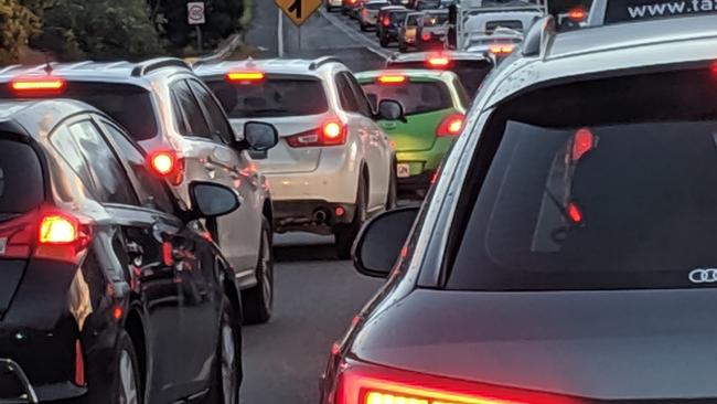 Commuters grind to a halt on Southern Outlet after a crash blocks traffic. Picture: DAVID KILLICK