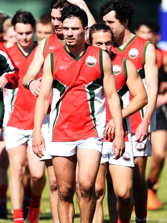 Henley’s Izak Rankine leads his team off after they defeated Rostrevor in the state knockout footy preliminary final at Woodville Oval. Picture: AAP/Mark Brake