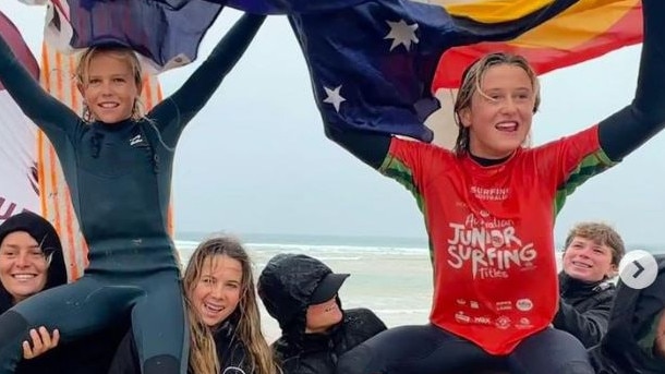 Coffs Harbour brothers Luca and Will Martin are chaired up the beach at Phillip Island after winning the 2023 MR Shield for 16 years and under at the Australian Junior Surfing Titles at Phillip Island.