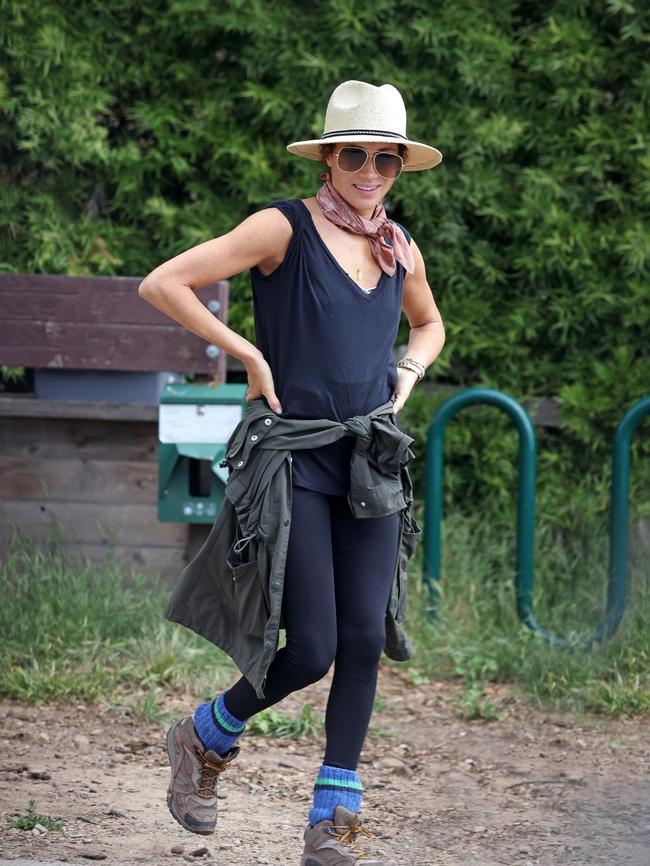 Meghan pictured hiking over the coronation weekend. Insiders believe the image was, if not directly arranged commercially, then offered as a blueprint for how the duchess may work with brands in future. Picture: ACKGS/BACKGRID