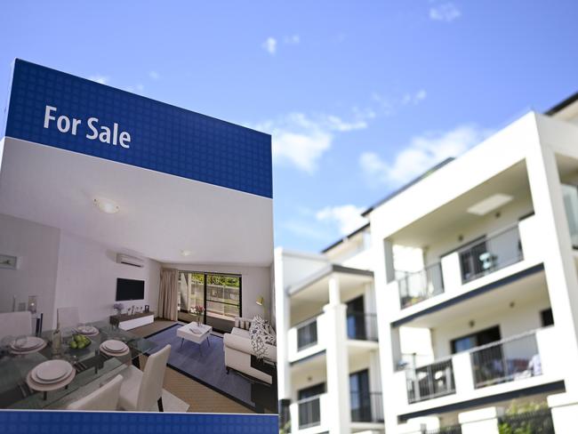 A real estate advertising board is seen next to a house in Canberra, Friday, March 1, 2019. (AAP Image/Lukas Coch) NO ARCHIVING