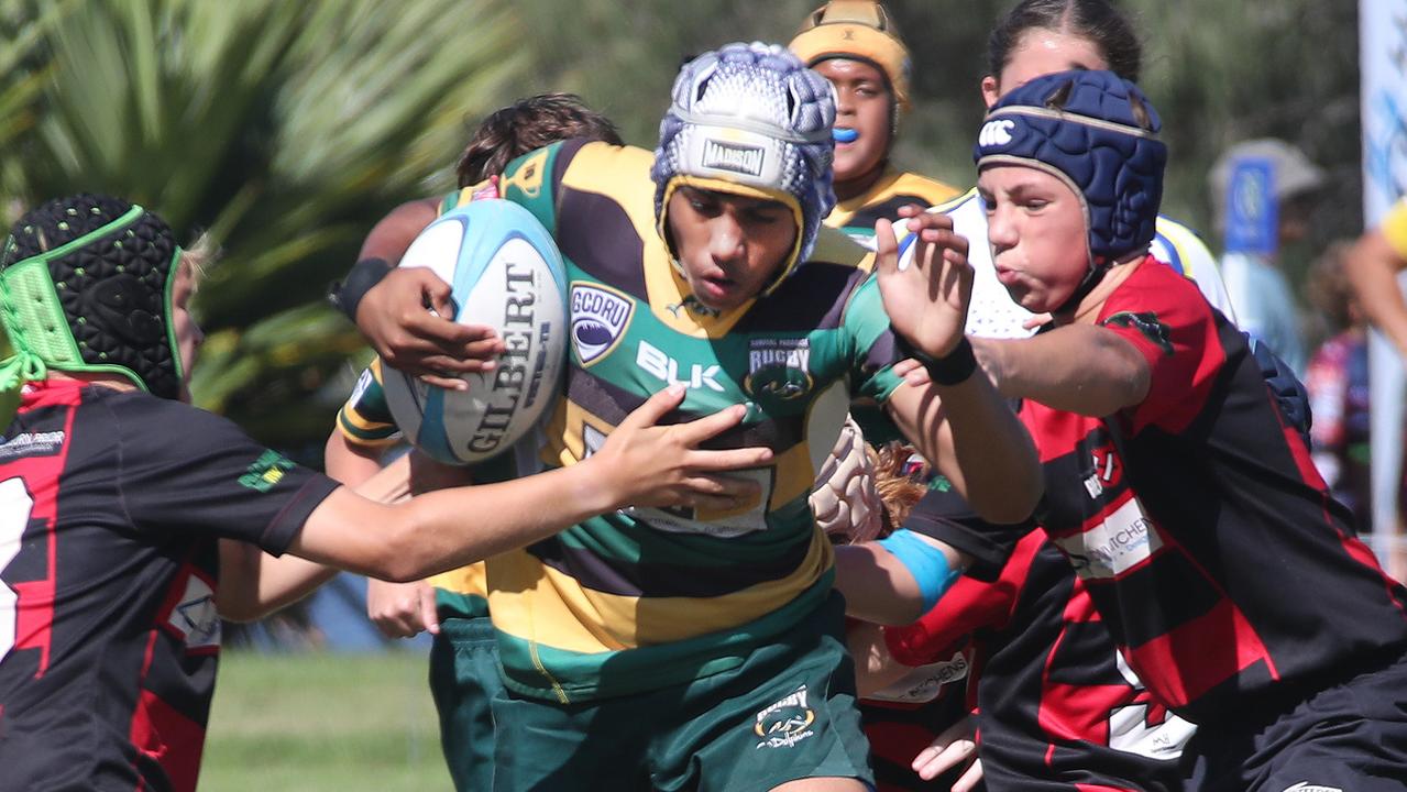 King of the Country U/13 Rugby Union tournament at Overall park Southport. Surfers Paradise(Yellow Green ) V Far North Coast (red black). Picture Glenn Hampson