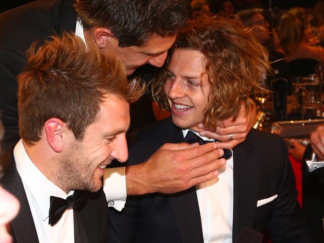 Nat Fyfe gets a hug from Fremantle skipper Matthew Pavlich after winning the 2015 Brownlow Medal. Picture: Colleen Petch