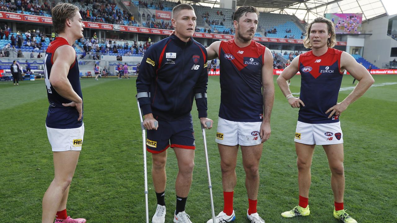 Adam Tomlinson with teammates Trent Rivers, Michael Hibberd and Ed Langdon.