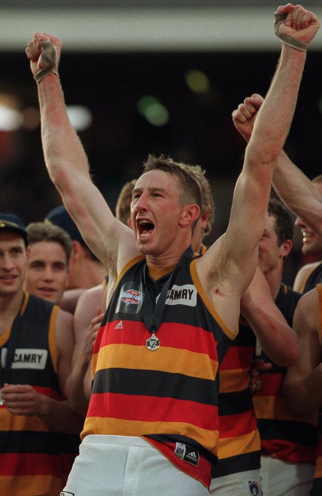 Adelaide’s Shaun Rehn celebrates winning the 1998 AFL premiership.