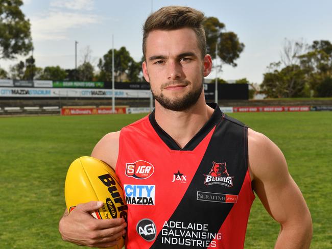 Will Snelling poses for a photograph at West Adelaide football club, Richmond, Adelaide on Saturday the 1st of December 2018. Will has returned to West Adelaide - his junior SANFL club - after being delisted by the Power last month and not selected at the AFL drafts.  (AAP/ Keryn Stevens)