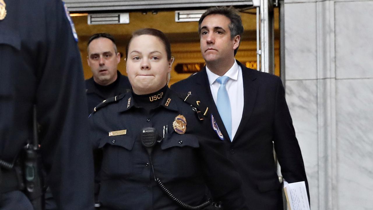 Michael Cohen, right, pictured leaving Capitol Hill after testifying before Congress. Picture: AP