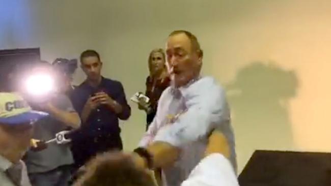 Senator Fraser Anning reacts to being egged.