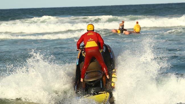 Police and surf lifesavers search for a suspected missing swimmer just north of Southport SLSC.