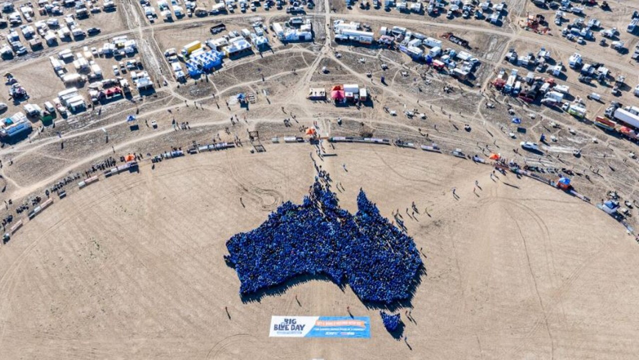 The human map with the Big Red Bash in the background. Picture: Matt Williams