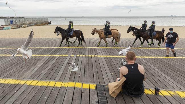 Police patrols at St Kilda beach after crowds gathered on the weekend. Picture: NCA NewsWire/Daniel Pockett