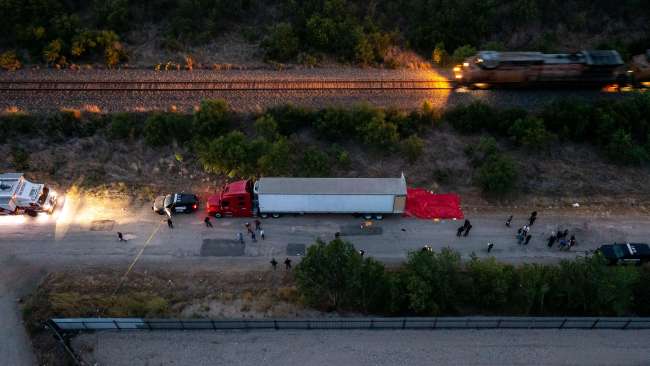 A worker in San Antonio has discovered the bodies of 46 suspected migrants inside the trailer of a truck by the side of a Texas road. Picture: Jordan Vonderhaar/Getty Images