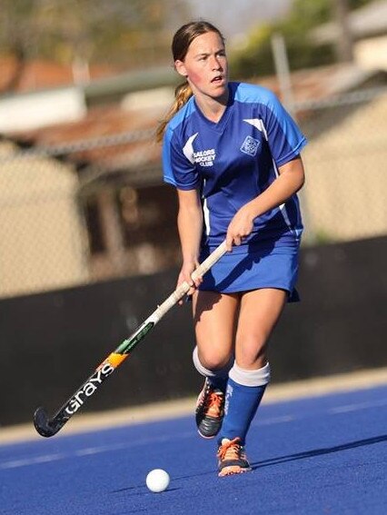 Ashleigh Ensbey searches for a player upfield during the Grafton Hockey Association Under-16 grand final at Brent Livermore Field in 2018.